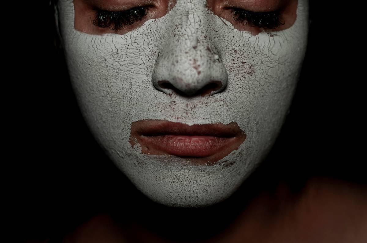 Close-up photo of a woman testing gentle makeup on her hand