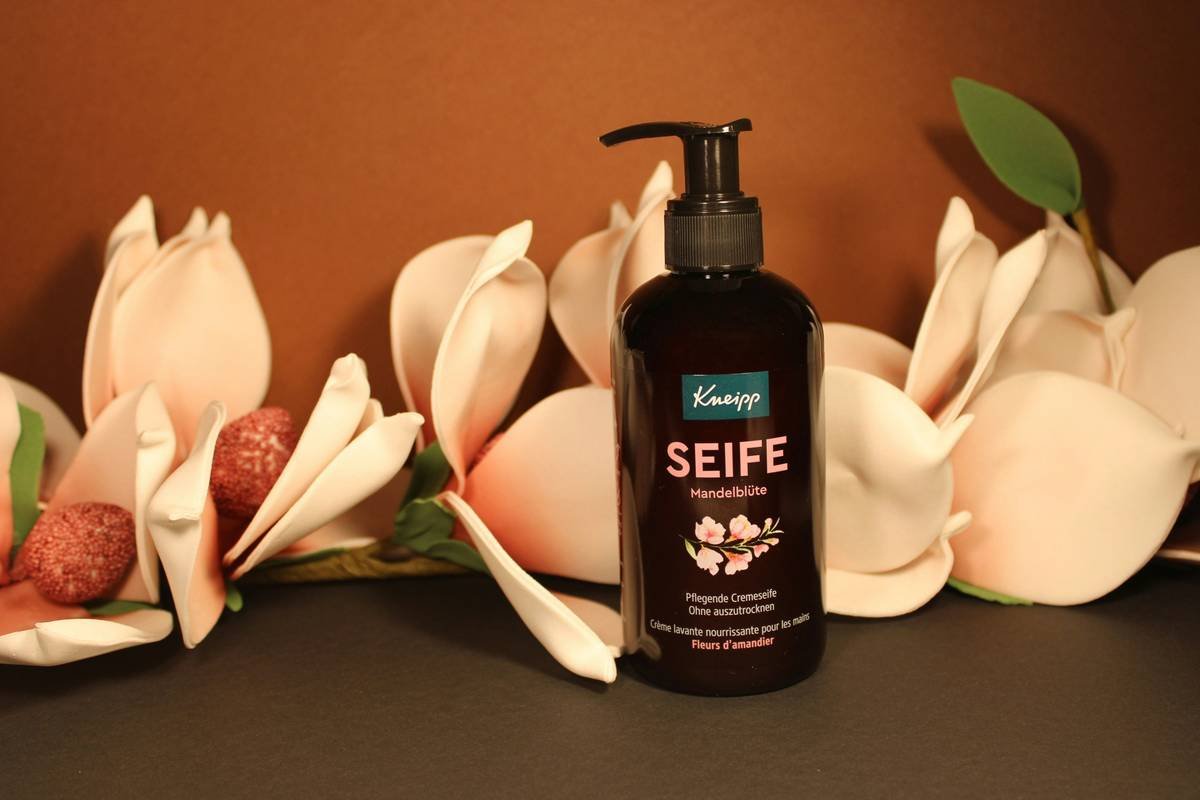 Before and after images of Sarah's skin, showing significant improvement