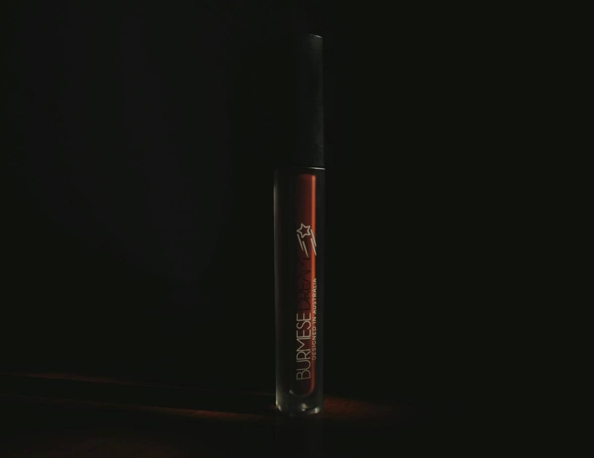 red and black make up brush