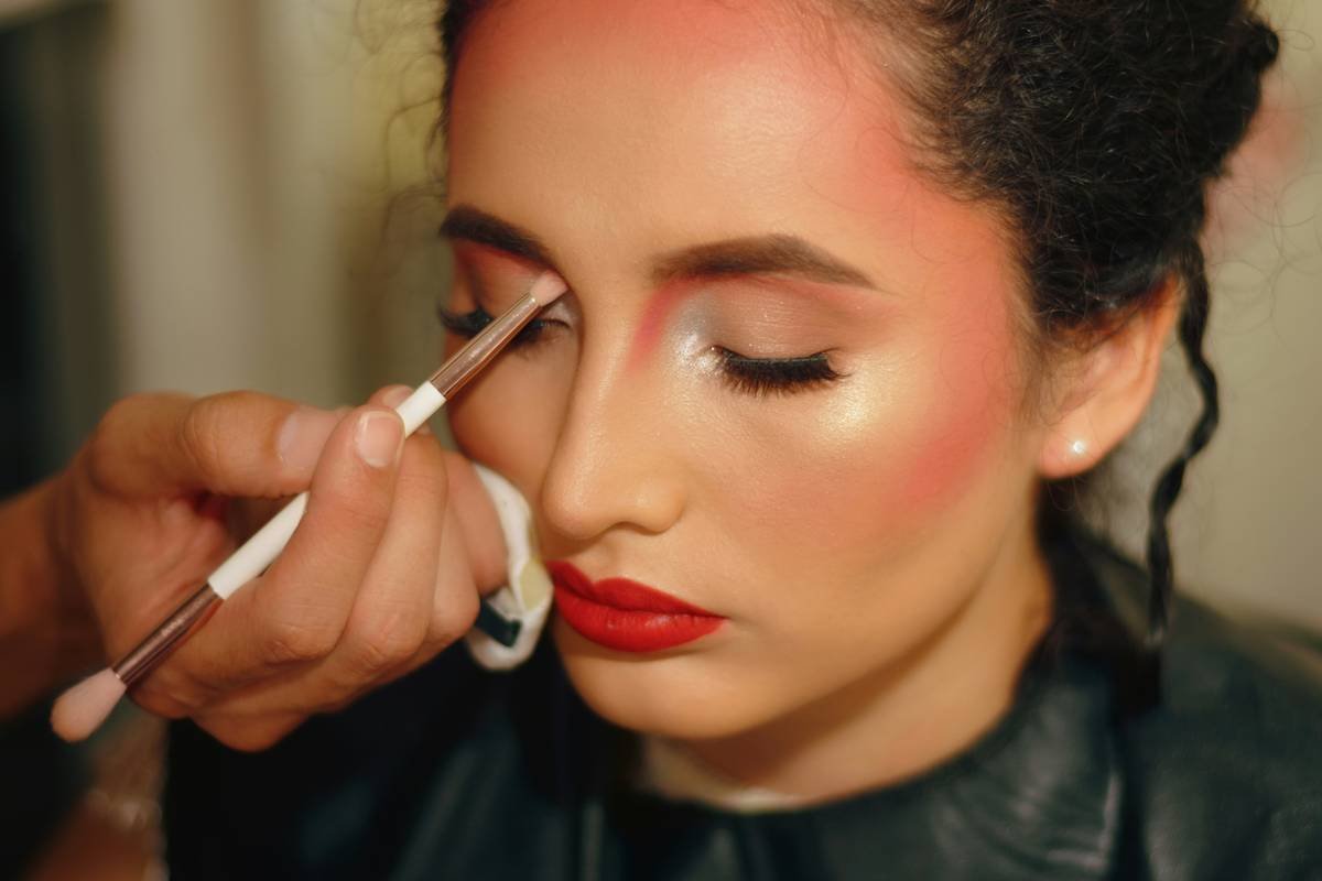 Makeup Artist working with Model